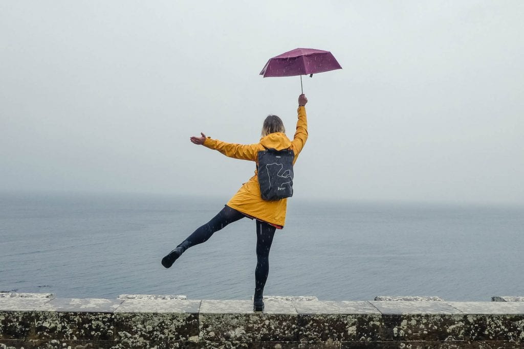 While umbrellas make for pretty photo props, they are rather useless in protecting you against Scottish weather. It's better to invest in a good rain jacket for your trip to Scotland!