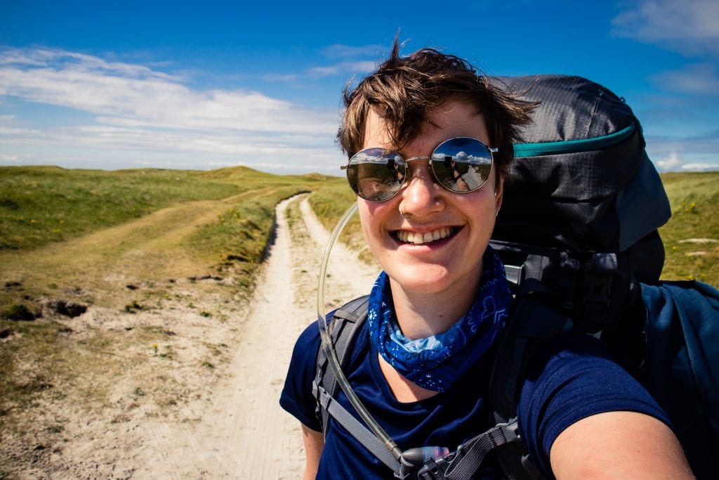 Day 2 Girl walking on South Uist - Hebridean Way in 12 days