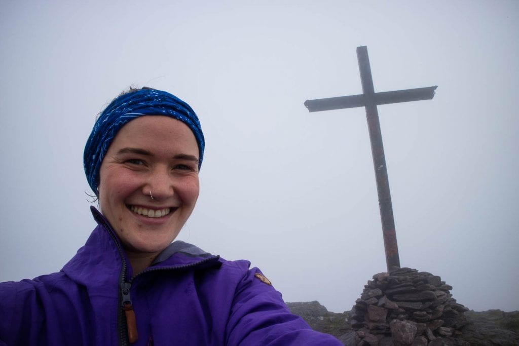 This is a hiking guide about how to climb Carrauntoohil, the highest mountain in Ireland, with different hiking trails up Carrauntoohil and what to pack!