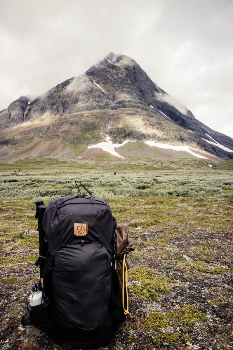 A Fjallraven trekking backpack in the mountains of Sweden. - The best trekking backpacks & their must-have features
